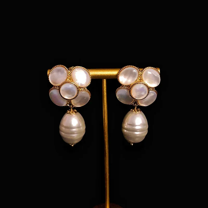 

Classic camellia earrings from a niche designer