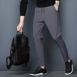 Jesienno-zimowa męska elastyczny, wysoki talia jednolite, z kieszeniami Harlan sportowa codzienna spodnie ściągane sznurkiem moda biurowa luźne spodnie damskie