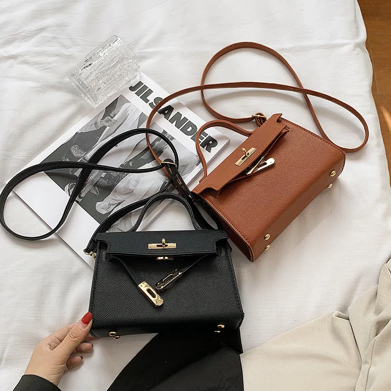 Bolso de mujer de nuevo estilo con cierre de cerradura, bolso de mujer a la moda, bolso de hombro de mujer en relieve, bolso cruzado Popular