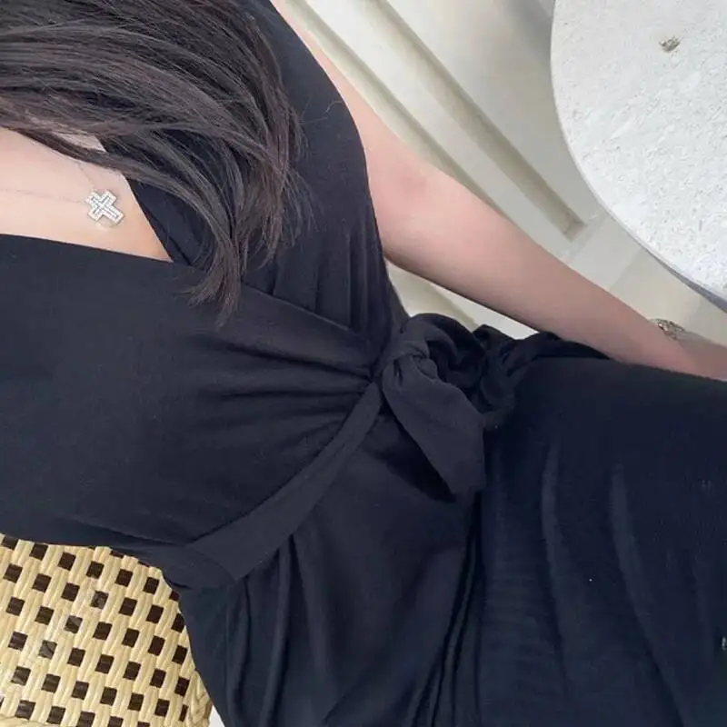 Corea sexy vita-serraggio cravatta spalla imbottita profondo scollo a V elegante abito lungo senza maniche moda donna sexy top UTW2