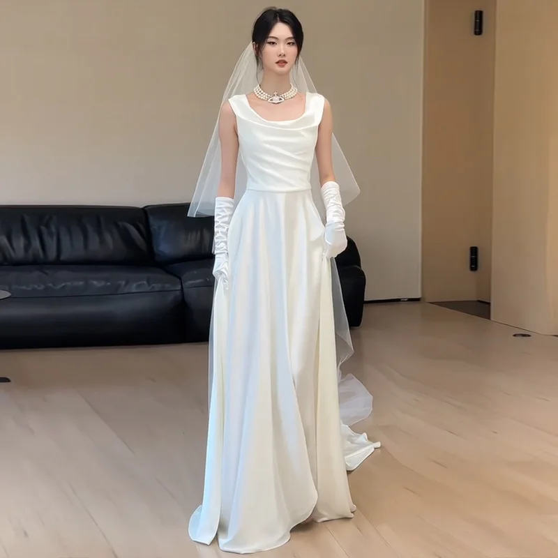 Fotografía de viaje vestido de novia ligero novia Simple de gama alta vestido de novia de satén francés vestido de nicho adelgazante recepción salida velo
