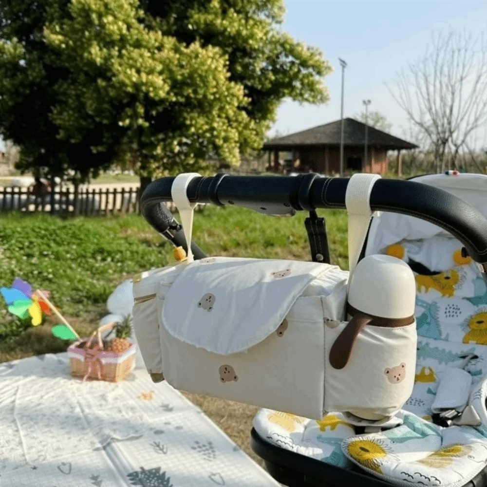 Bonito dos desenhos animados carrinho organizador saco urso pano pram saco de armazenamento garrafa de fraldas saco de mamãe carrinho de bebê saco de viagem