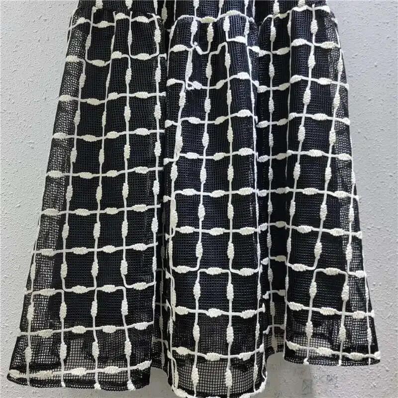 Maille crochet creux fleur grille conception Style jupe tempérament fée tout-match robe pour les femmes printemps nouvelle marée