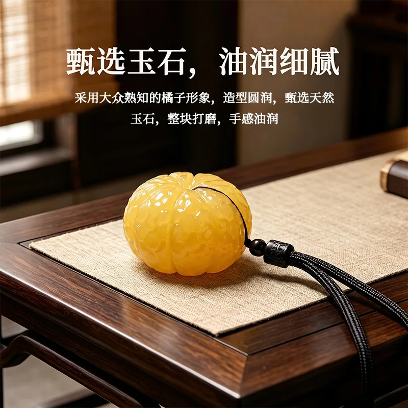 Yellow jade stone orange hand-held ornament, a portable cultural item for personal enjoyment, a decorative piece, a great gift f