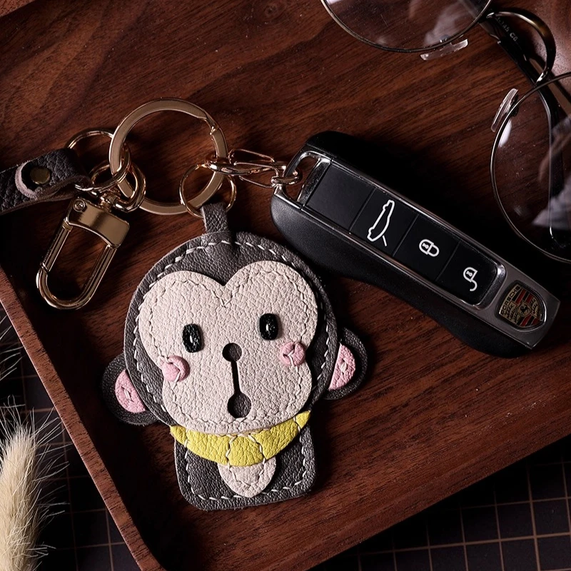 จี้รูปลิงน้อย, จี้กระเป๋าหนังแกะฝรั่งเศส, จี้โทรศัพท์, พวงกุญแจหนังแท้ทำมือ