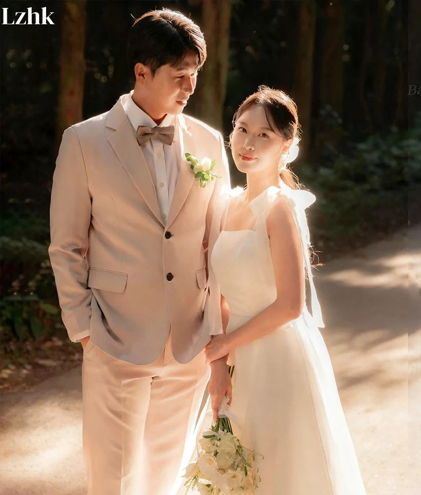 ชุดราตรีทรงเอไลน์ผ้าทูลล์คุณภาพสูงแบบสั่งทำพิเศษ สายเดี่ยวแบบสปาเก็ตตี้ ประดับโบว์ 3 มิติ ดีไซน์ทันสมัย ไม่มีสายคล้องไหล่ สำหรับงานแต่งงาน