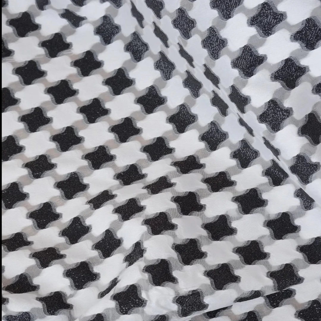 

49% silk 51% fashion fabric, black and white jacquard dress fabric, width 148CM