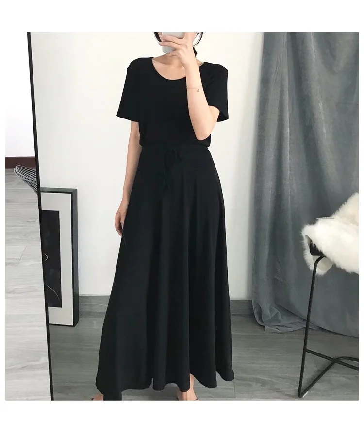 Conjunto casual de saia evasê com bainha ampla, duas peças, cseta modal foada com fenda lateral e saia midi, estilo core...