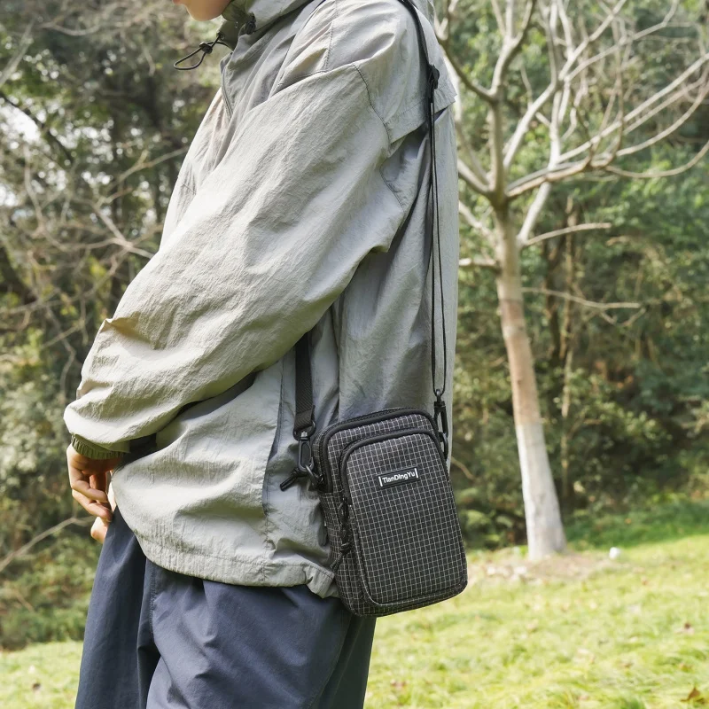 Lightweight outdoor sports chest bag, unisex crossbody bag, portable shoulder bag, travel and hiking vertical phone bag