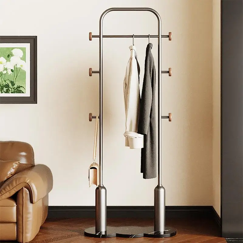 

Light luxury high-end hangers, floor-to-ceiling bedroom hangers, medieval living room clothes storage hangers, and the door is v