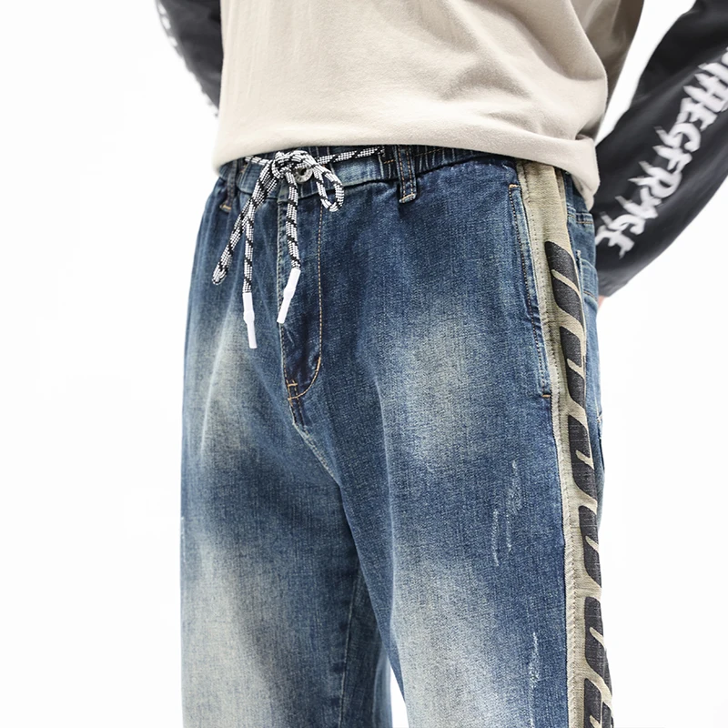 Jeans Men Oversize Pants Harem Joggers Elastic Waist Streetwear Side Striped Tapered Jeans Kpop Loose Fit Male Denim Trousers