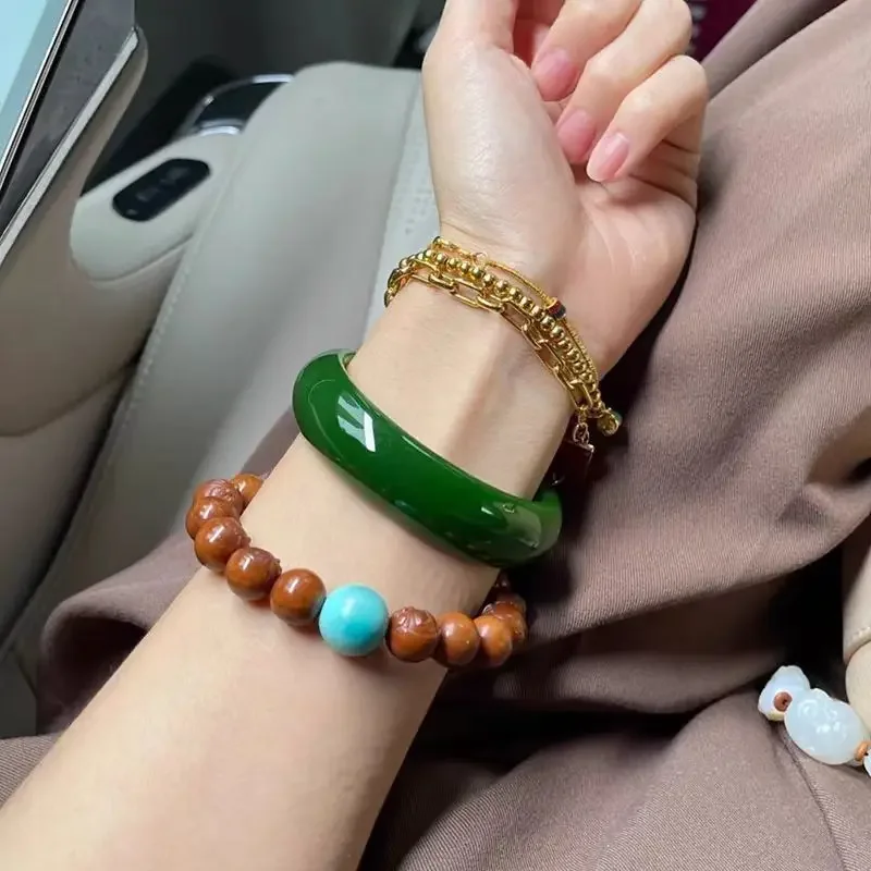 

Natural Hetian bracelet jade female model female jade Xinjiang spinach green bracelet emperor green mother bracelet