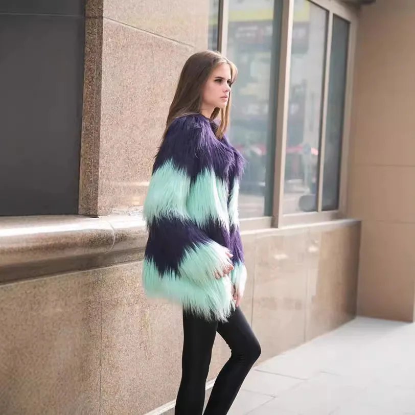 Imitation fur jacket women's clothing splicing fluorescent coat long hair European and American dark button fur integrated coat