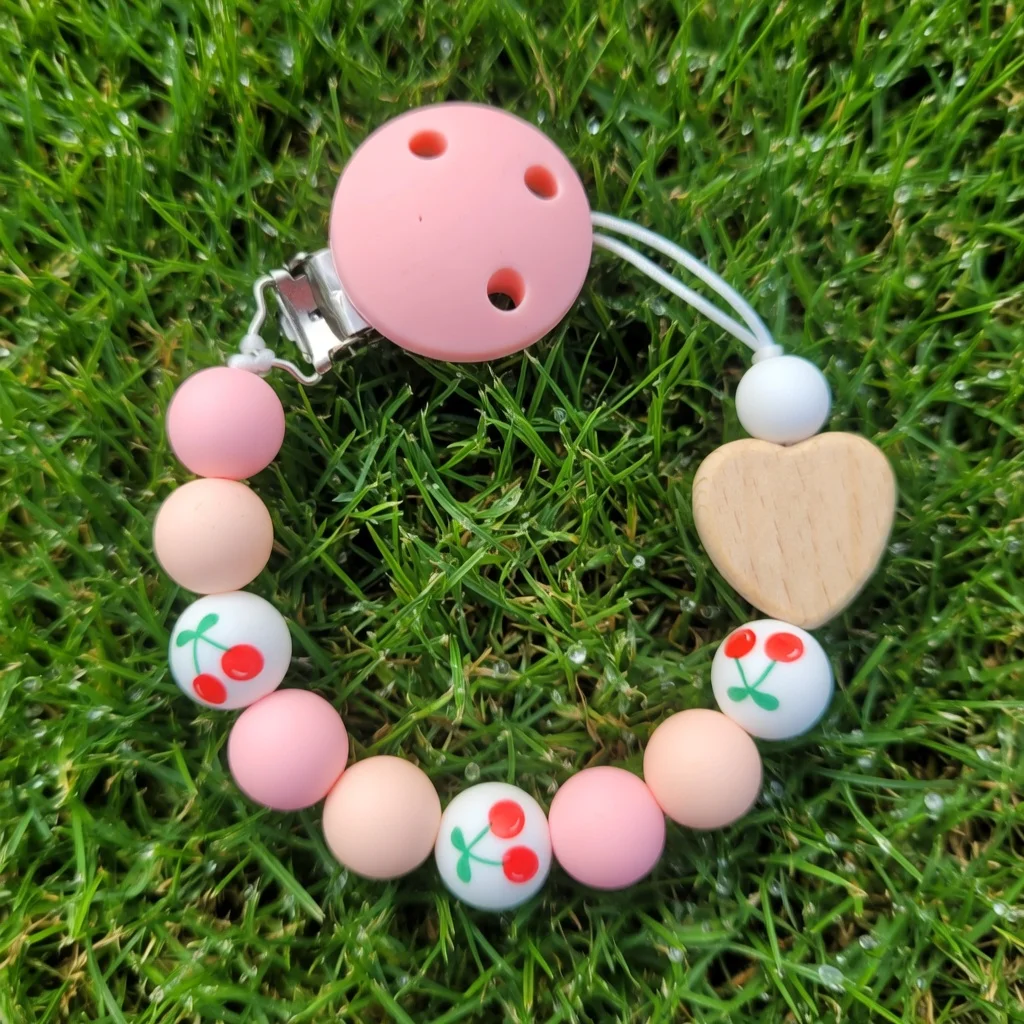 S7766ffe5d7414bfc801a906186c3b1c3B - Personalised Dummy Clips UK