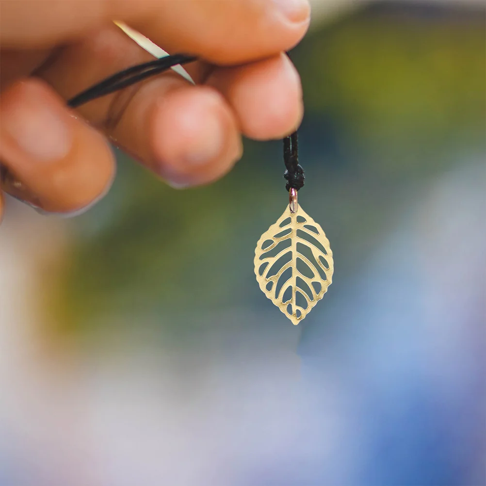 

200 Pcs Necklace Golden Hollow Leaves Pendant Metal Craft Charms Leaf for Jewelry Making Tree