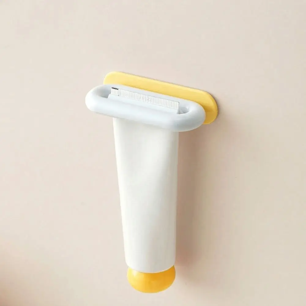 Punch-free Toothpaste Dispenser Self-adhesive Anti-lost Wall-Mounted Extruder Space Saving Dental Care Toothpaste Rack Travel