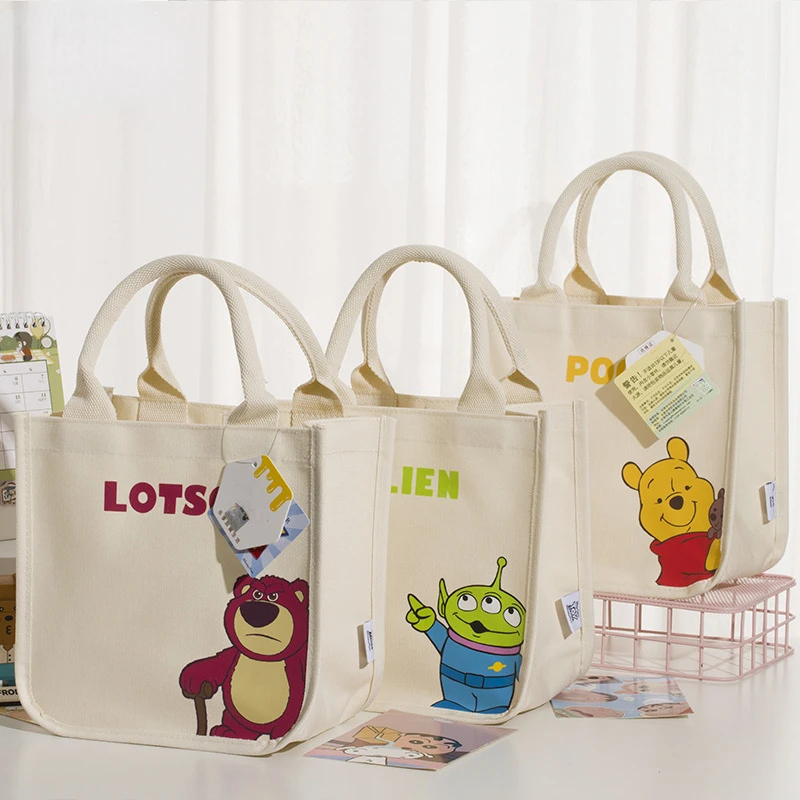 MINISO Disney Lotso Stitch bolso de mano de lona multiusos bolso de mano cuadrado de gran capacidad oso Alien Pooh lindo lavable al aire libre