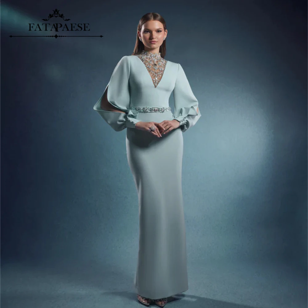 فساتين سهرة فاخرة من FATAPAESE بكريستال ورقبة عالية باللون الأزرق الفاتح للحفلات الراقصة بأكمام طويلة وحفلات الزفاف