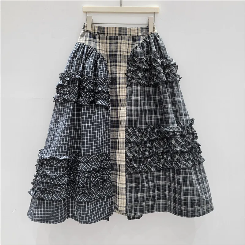 WTHT العصرية أزياء المرأة المرقعة تكدرت حافة منقوشة التنانير الطويلة 2025 ربيع جديد عالية الخصر ألف خط تنورة الإناث 1LS1217