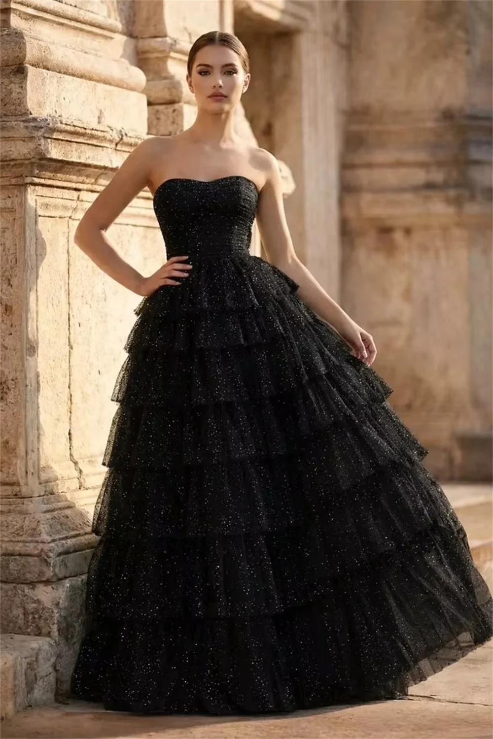 

Customized black strapless puffy dress with exquisite three-dimensional cut. Classic black presents premium charm, showing elega