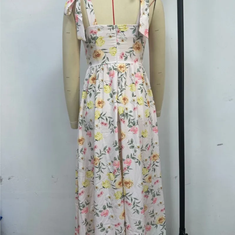 夏エレガントなノースリーブフラワープリントドレス弓サスペンダースクエアカラーハイウエストルーズ中空オフショルダービーチロングドレス