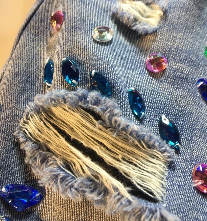 Distintivo nuovo stile industria pesante pantaloncini con perline vita alta stile occidentale pantaloni blu denim dritti strappati dimagranti da donna