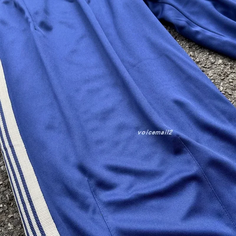 25ss bordado de mariposa AWGE pantalones de pierna ancha azules hombres mujeres 1:1 pantalones casuales a rayas Jogger pantalones con cordón para hombre