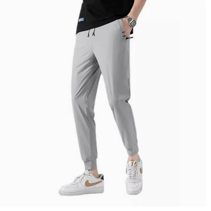 

Summer casual pants men slim plus size bunched feet fashion thin fashion brand pocket zipper men's pants