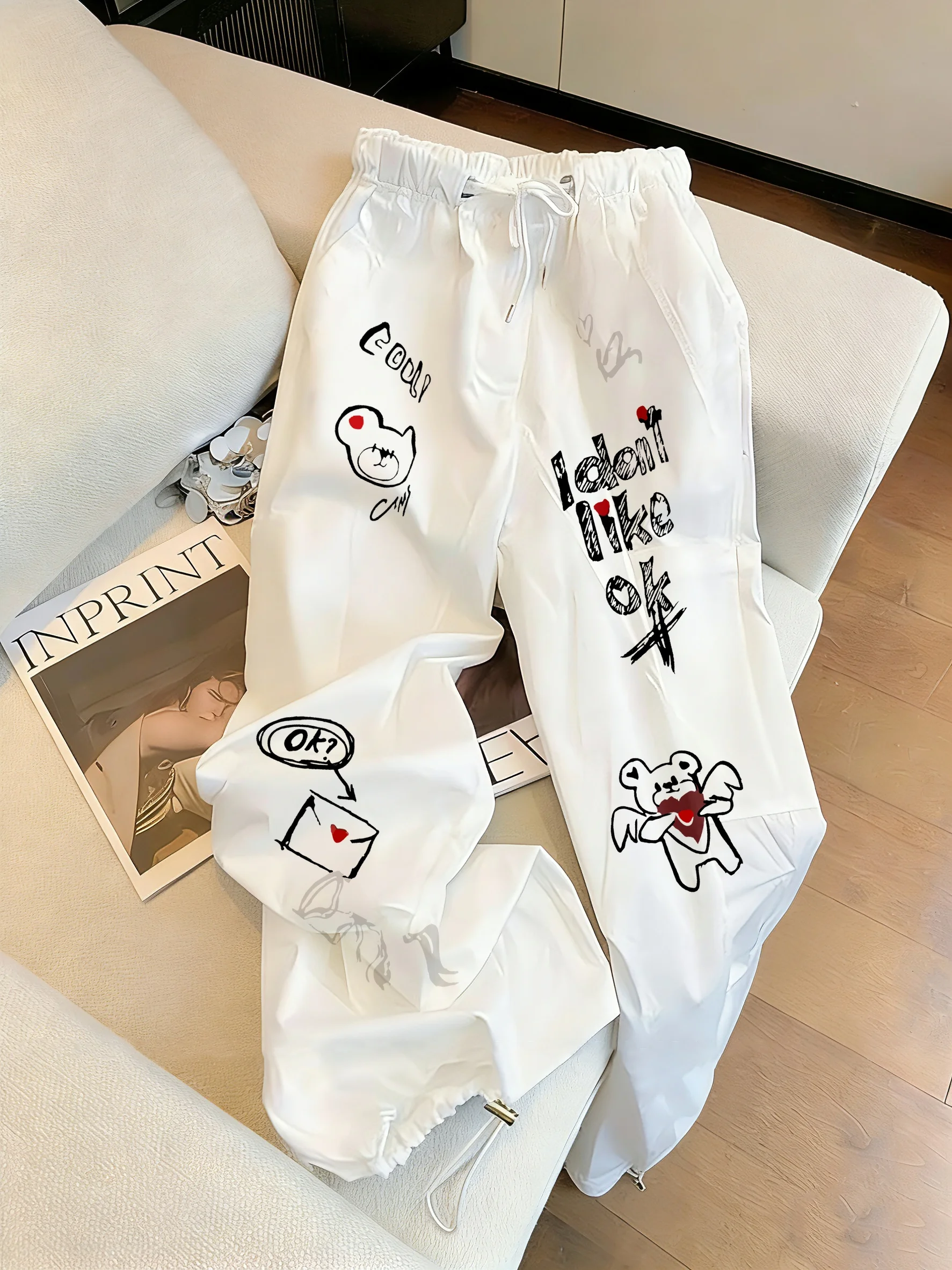 

Retro Fun Graffiti Bear White Casual Pants Loose Fit Summer Thin Loose Cuffed Sports Pants Unisex Youthful Style Straight Leg