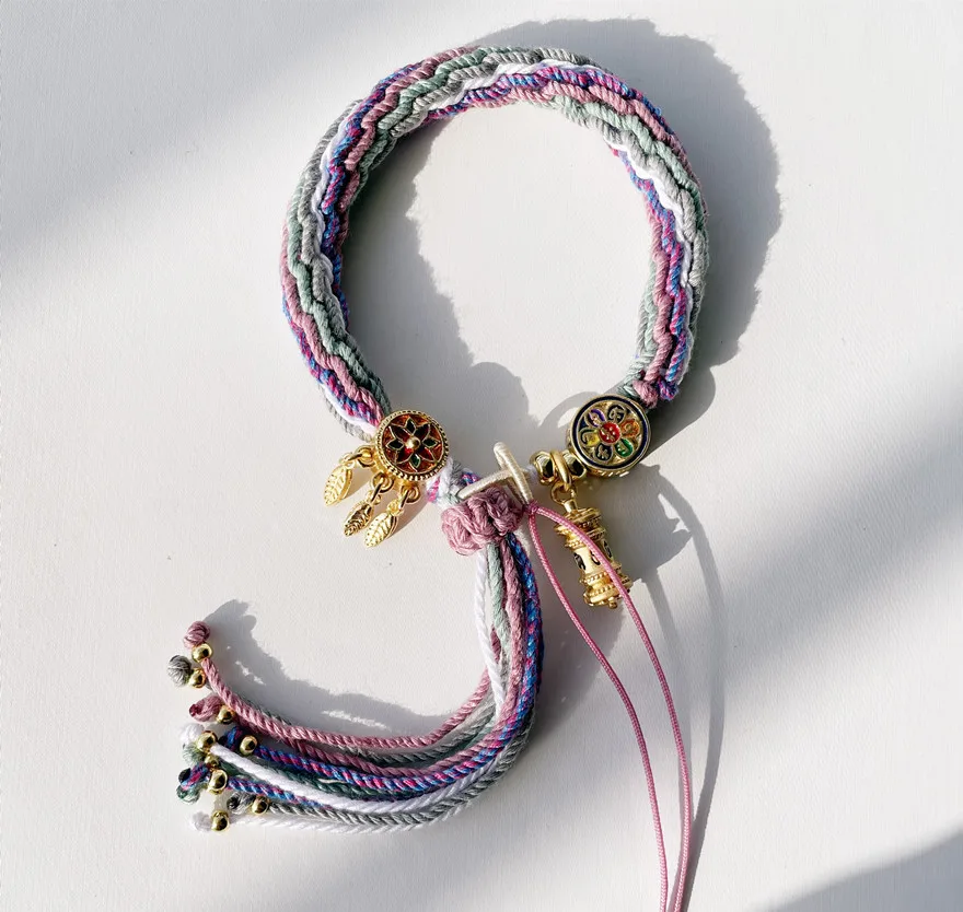 Hand-woven Tibetan Wind Wheel Back Hand Rope Zakiram Purple Tara Yellow God of Wealth Manjusri Thangka bracelet Tibetan hand rop