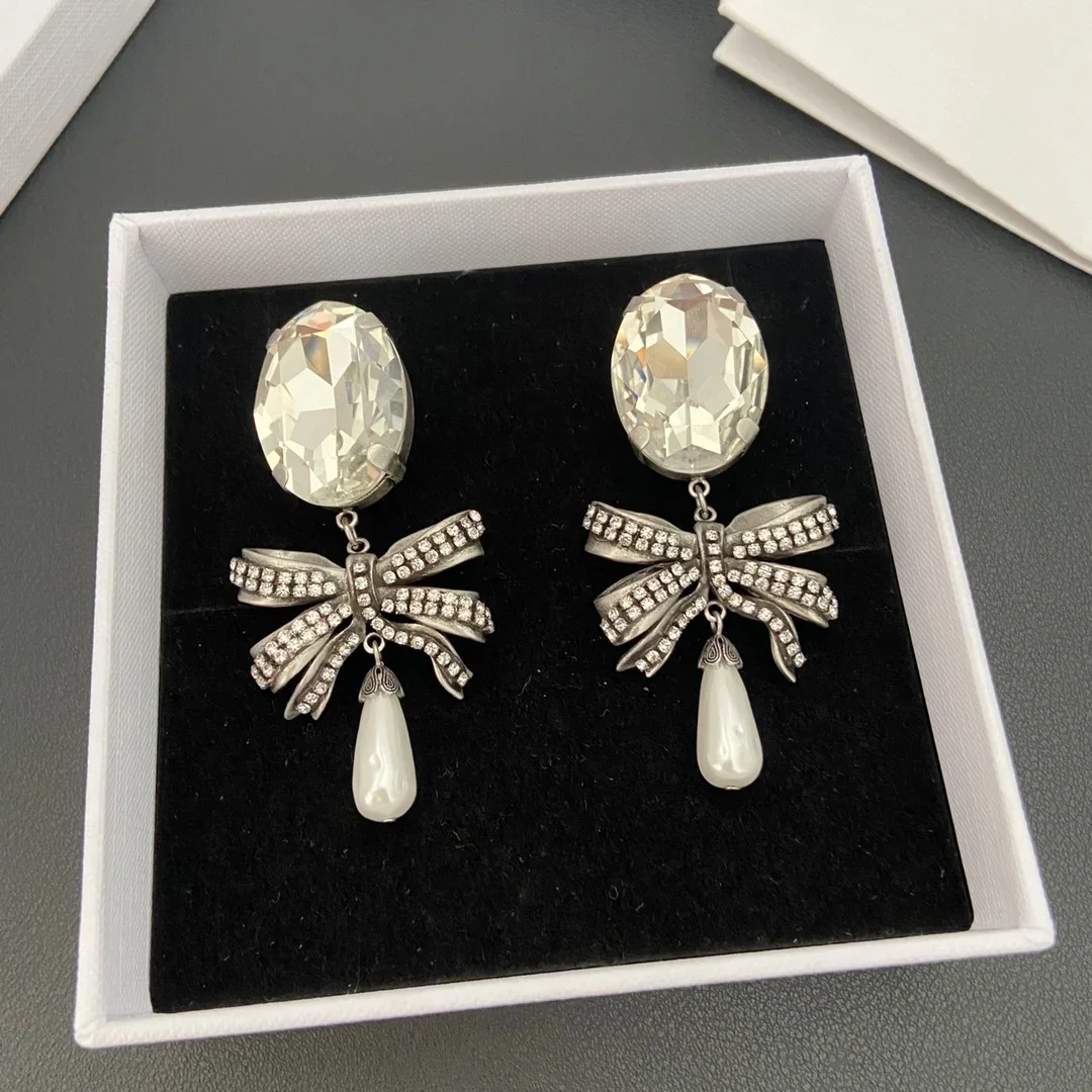 

Fashion Bow Crystal Ear Clip Large Earrings Women Top Quality Luxury Jewelry Europe America Designer Brand Trend