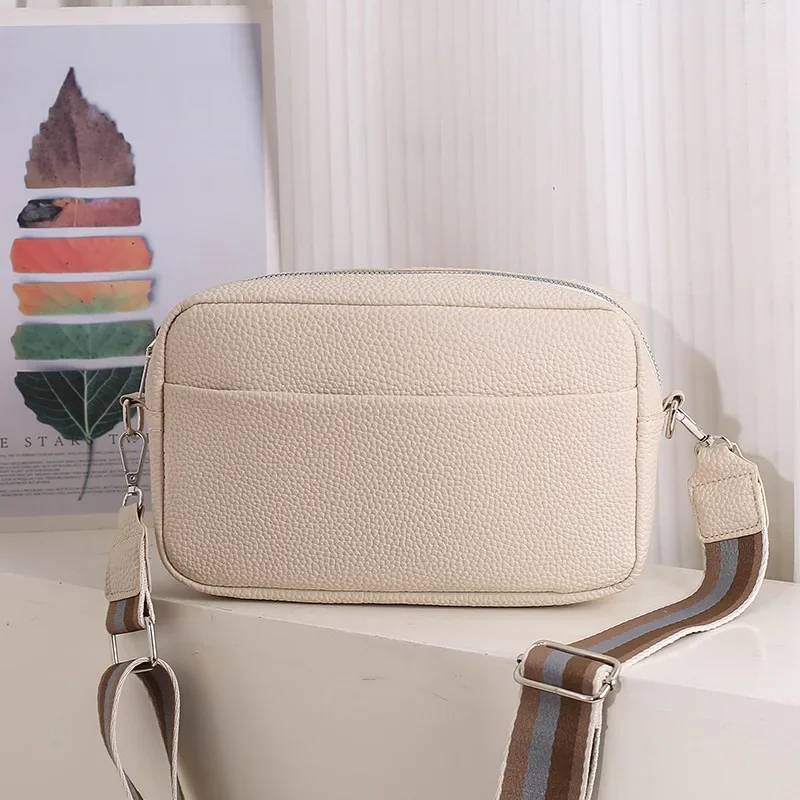 

Lychee patterned women's crossbody bag 2024 new niche wide shoulder straps, fashionable simple single shoulder bag