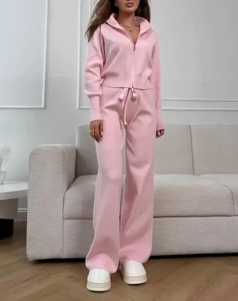 Tweedelige set damesoutfit 2025 herfst winter nieuwe commuter dubbele rits lange mouw gebreide top en hoge taille casual broek set