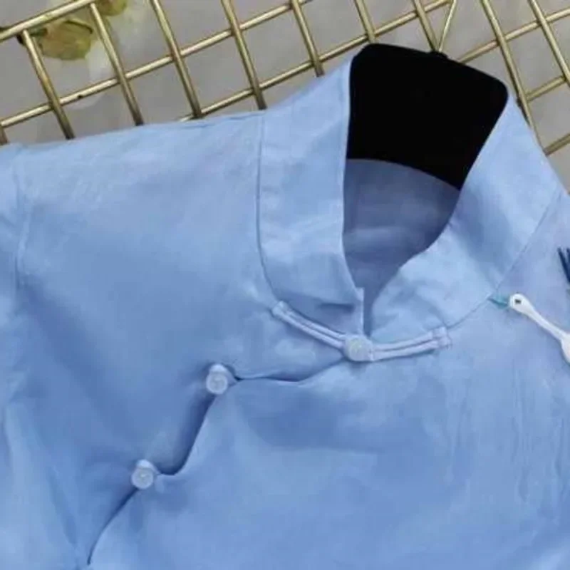 قميص تانغ مطرز على الطراز الوطني قميص ريترو كرين مطرز صيني قميص نسائي جديد أنيق فضفاض أبيض وأزرق قميص الهانبوك