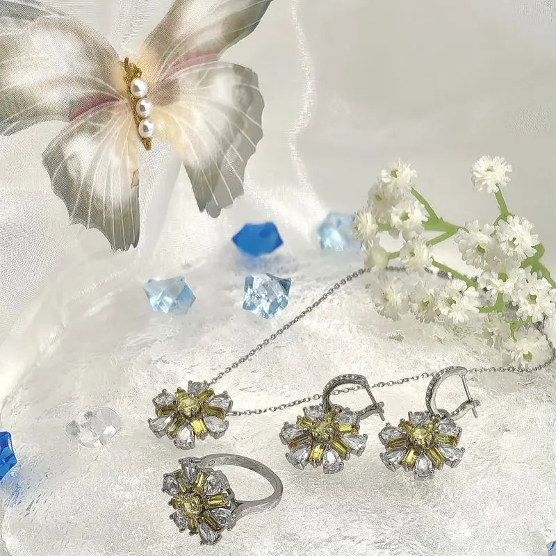 قلادة وأقراط وخاتم من الفضة الإسترليني عيار 925 مرصعة بالألماس الأصفر والأبيض وشعار SWA: أنيق وساحر