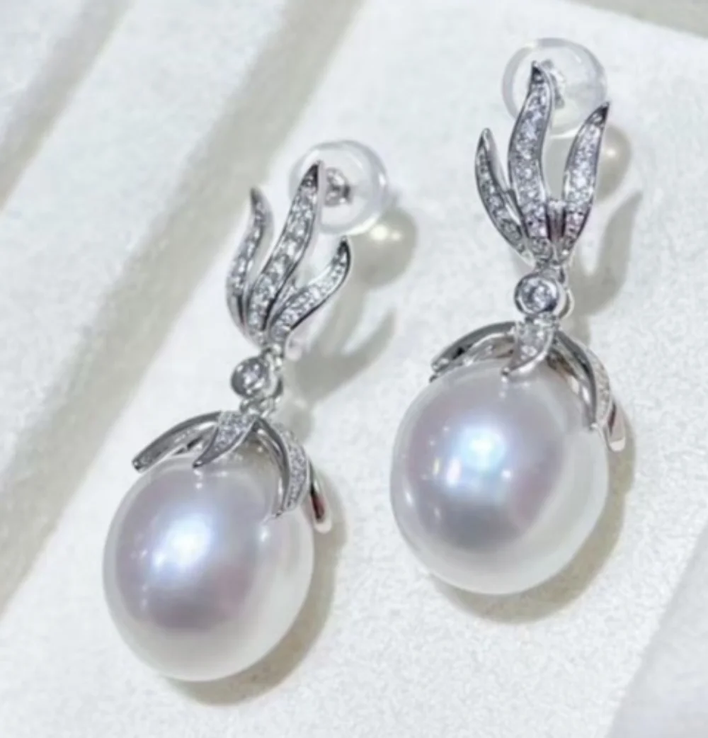 

Elegant 10-11mm South Sea Drop White Pearl Dangle Earring 925s