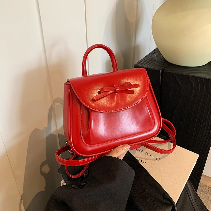 

Handheld Bow Bag for Women's 2024 Summer New Korean Edition Pearl Light Casual Shoulder Bag Versatile Trendy Backpack