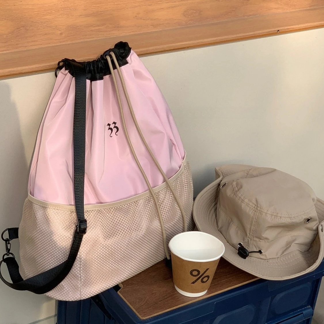 Outdoor functional wind backpack, large-capacity drawstring schoolbag