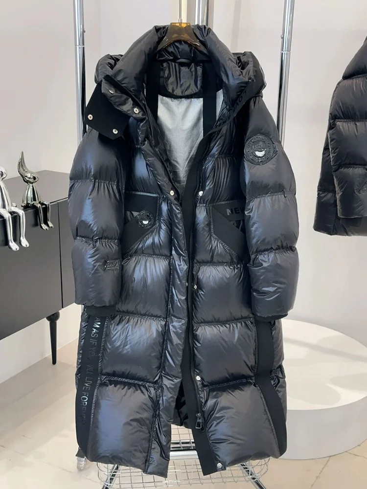 Chaqueta con capucha negra para mujer, diseño brillante, cálido, grueso, longitud media, moda de invierno y otoño, nuevo, 2024