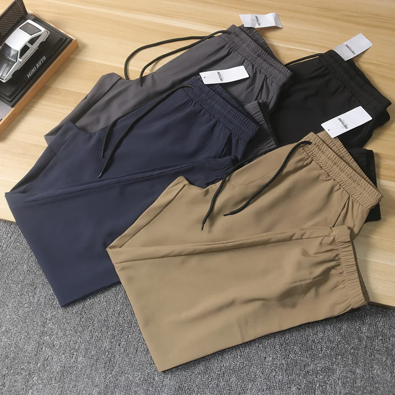 

Мужские летние уличные эластичные тонкие дышащие свободные спортивные повседневные брюки, легкие брюки с прямыми штанинами и манжетами