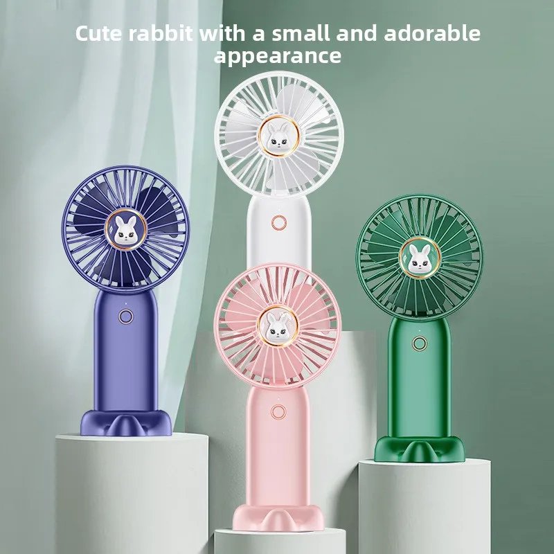 

New Mini Handheld Fan Charging Cartoon Handheld Small Fan Portable Office Student Desktop Fan