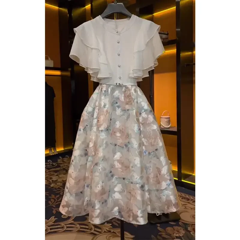 

French luxury gauze dress female summer 2024 high sense stitching heavy industry embroidery fashion lotus leaf sleeve skirt.