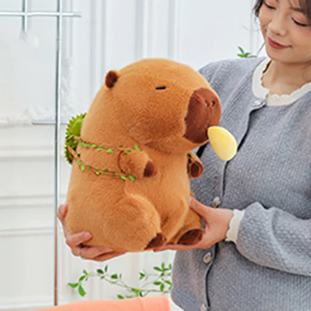 Manger Durian Capybara peluche poupée peut tirer PP coton Simulation Capybara ornements peluche fruits sac à dos peluche Capybara poupée