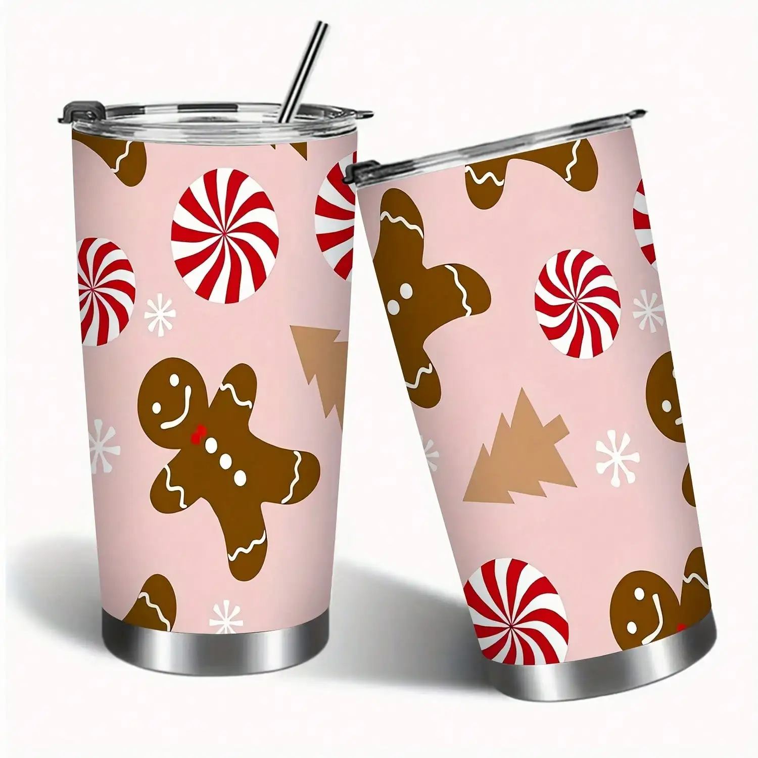 Una taza aislada de acero inoxidable de 20 onzas con tapa, diseñada con un patrón de hombre de jengibre con copo de nieve. Presenta aislamiento al vacío de doble capa para bebidas frías y calientes, y una tapa a prueba de fugas.