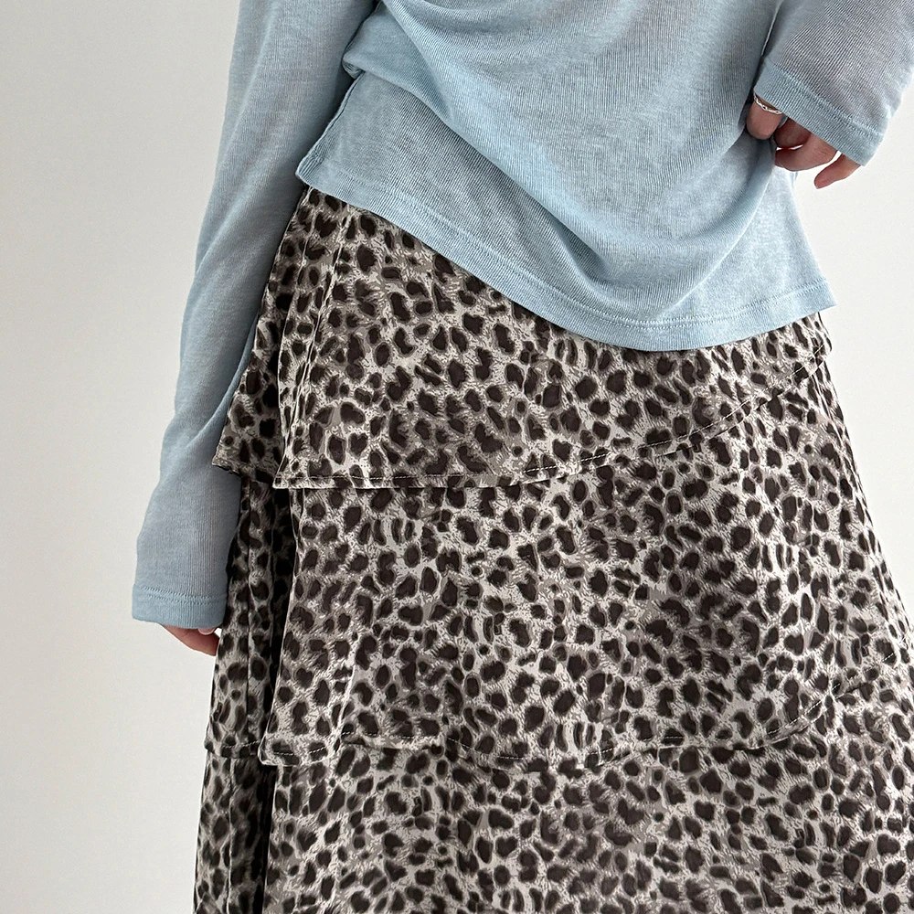 TWOTWINSTYLE Leopard High Waist Irregular Skirts for Women Patchwork Ruffles Fashion Long Skirt Female 2026 Spring Clothes New