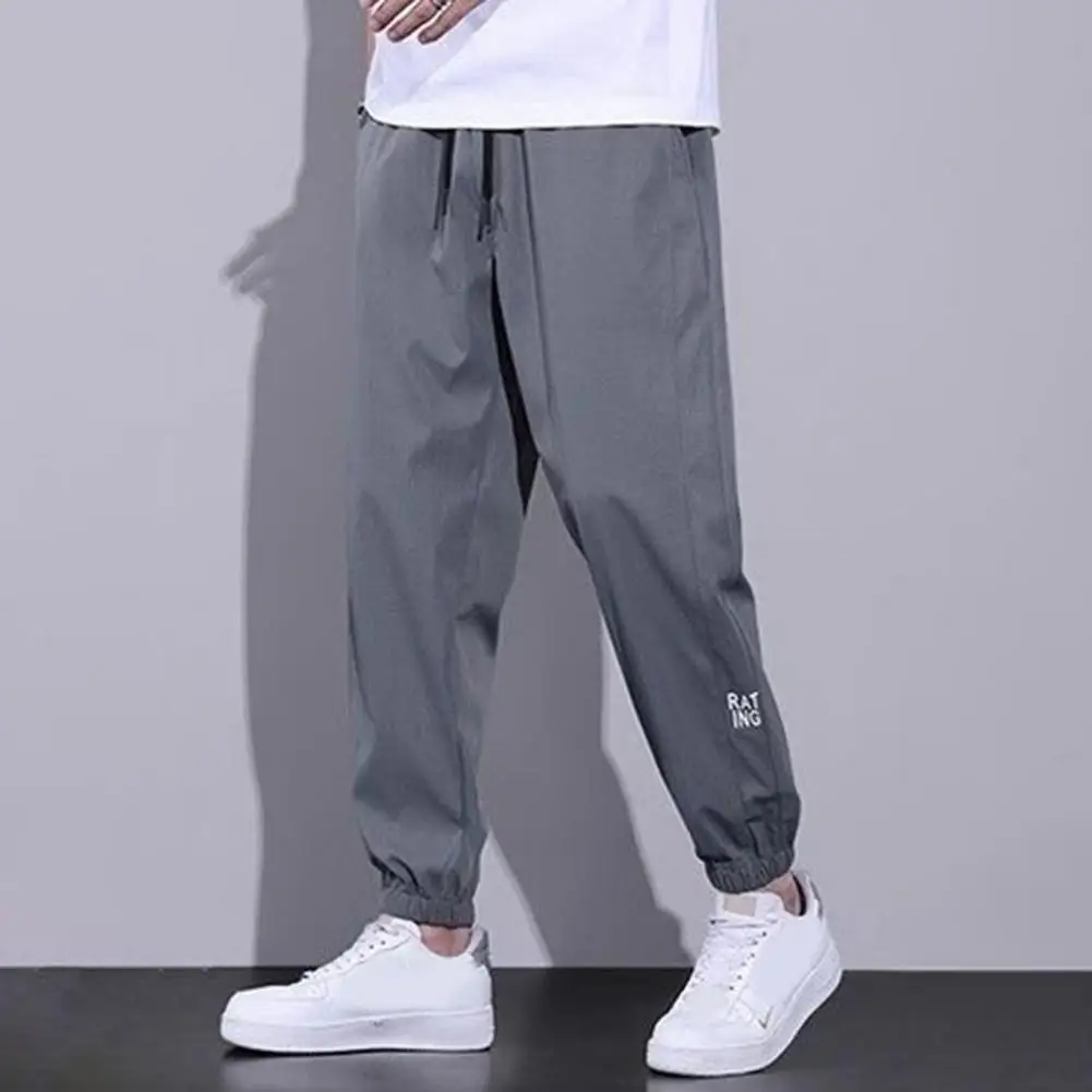 

Men Drawstring Waist Trousers Men Elastic Waist Pants Quick Dry Men's Harem Pants with Side Pockets Drawstring Waist for Jogging