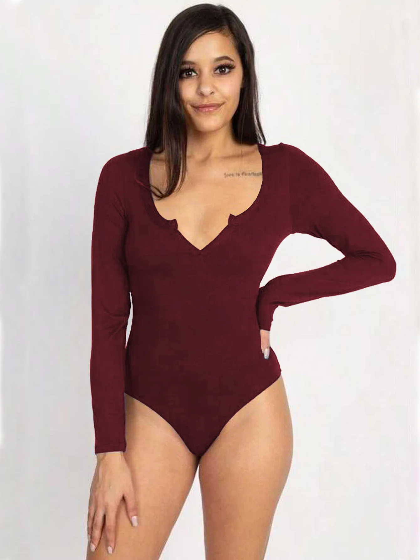 Macacão feminino europeu e americano com nervuras de manga comprida com gola entalhada e macacão justo