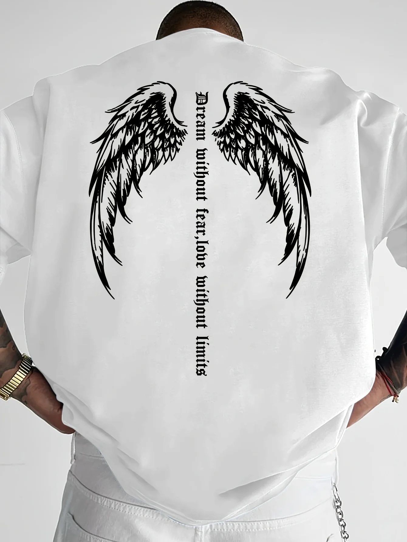 Gothic inspirational style T-shirt for men, featuring wing prints and text embellishments.  Couple's streetwear for all seasons.