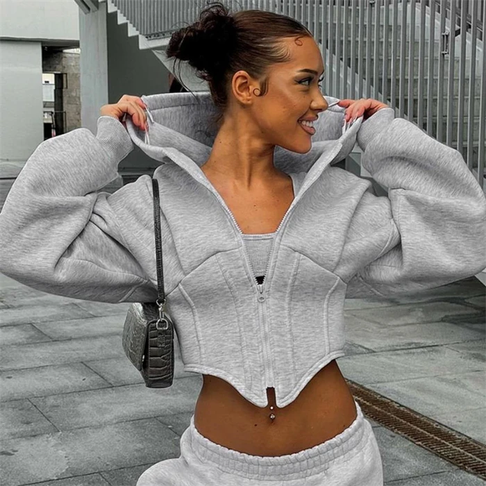 Elegancka długa bluza z kapturem i zamkiem błyskawicznym, krótka kurtka damska, dopasowany krój, odzież wierzchnia z kapturem i zamkiem, styl casual, moda uliczna.