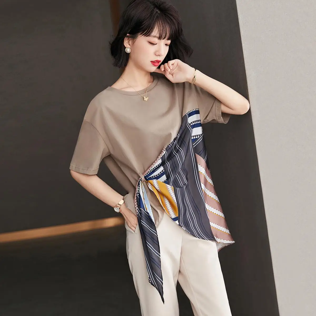 2023 summer new European and American style fashionable loose irregular T-shirt women's split short sleeve women